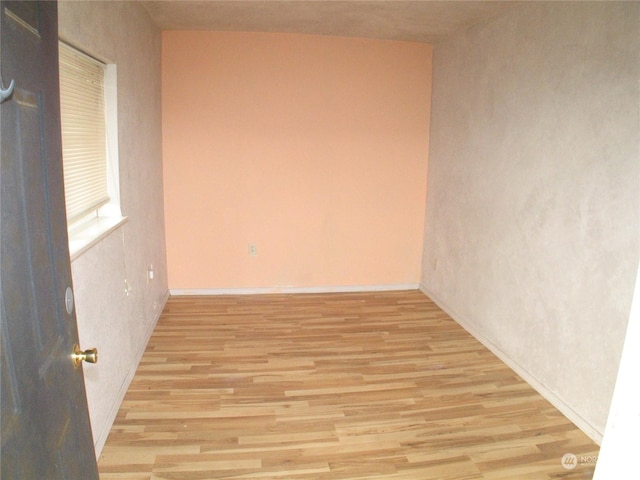 empty room featuring light hardwood / wood-style floors