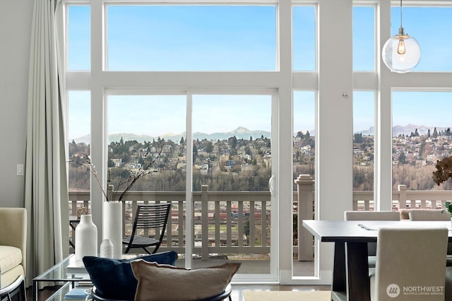 sunroom / solarium with a mountain view