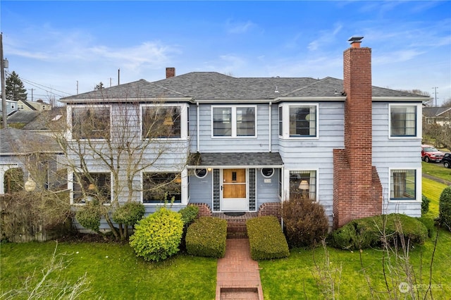 view of front of home with a front yard