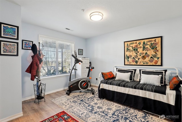 bedroom featuring light hardwood / wood-style flooring