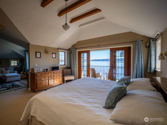 bedroom featuring access to exterior, carpet floors, lofted ceiling with beams, and a water view