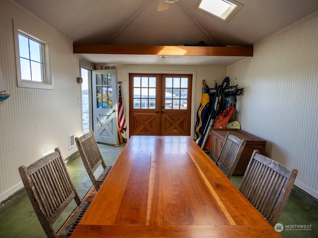 dining area featuring crown molding and french doors