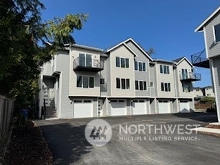 view of property featuring a garage