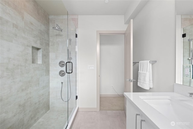 full bath featuring a shower stall and vanity