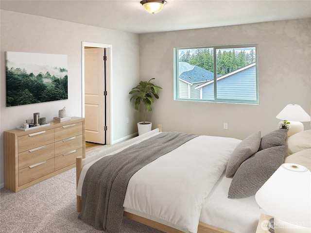 bedroom featuring light carpet