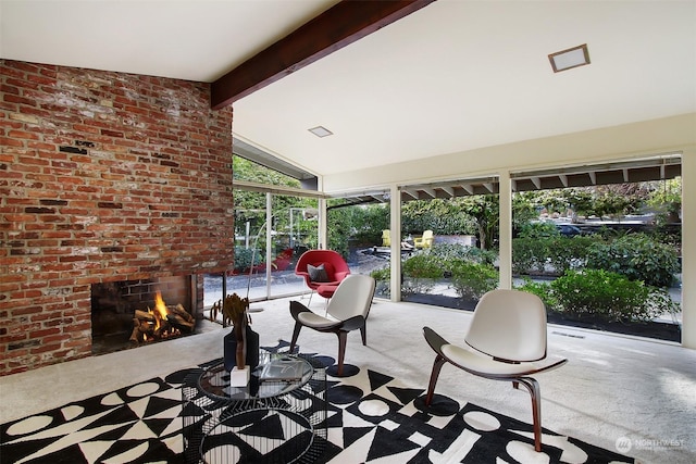 view of patio with a brick fireplace