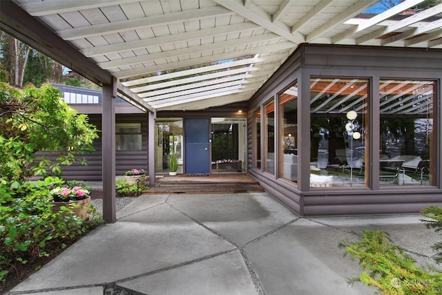 property entrance with a patio