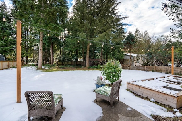 view of snow covered patio