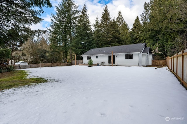 view of snow covered property