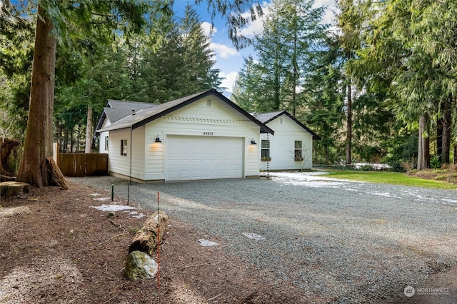 view of property exterior with a garage