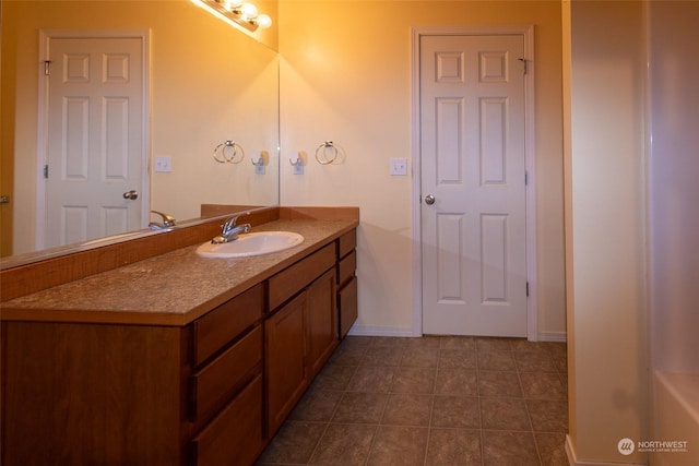 bathroom with vanity and tile patterned floors