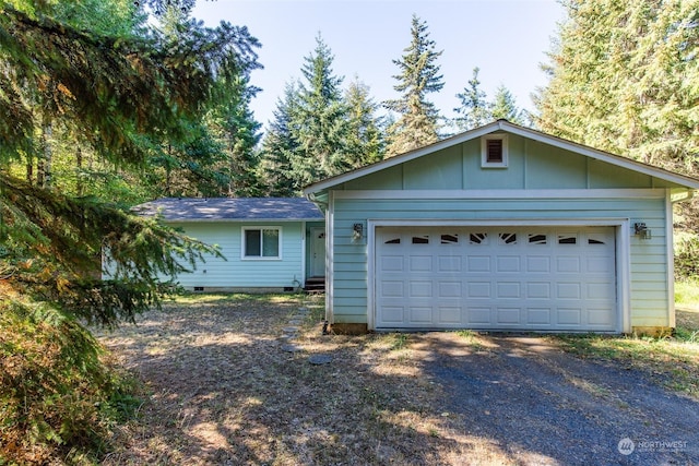 single story home with a garage