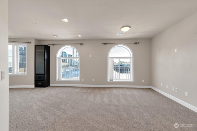 view of carpeted spare room