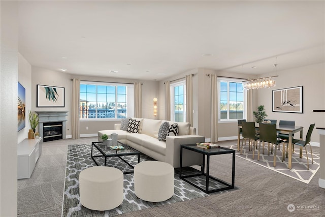 living room with light carpet and a chandelier