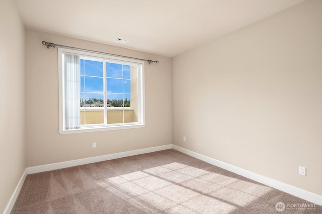 11004 NE 11th St Unit 606, Bellevue, WA 98004 - carpeted empty room featuring baseboards