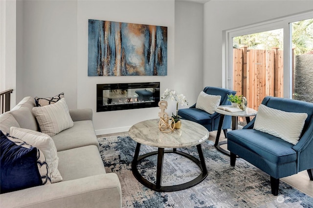 sitting room with hardwood / wood-style floors