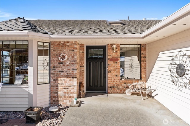 doorway to property with a patio