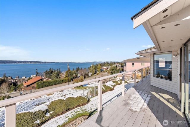 deck featuring a water view