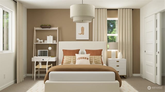 bedroom featuring light colored carpet