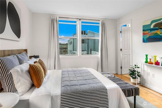 bedroom featuring hardwood / wood-style flooring