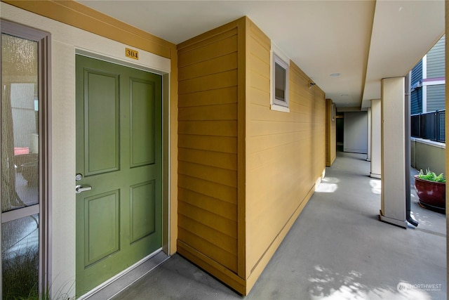 doorway to property featuring a porch