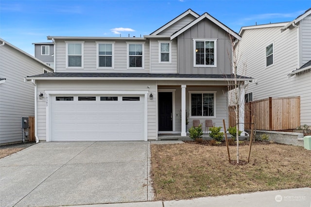 view of front of property with a garage and a porch