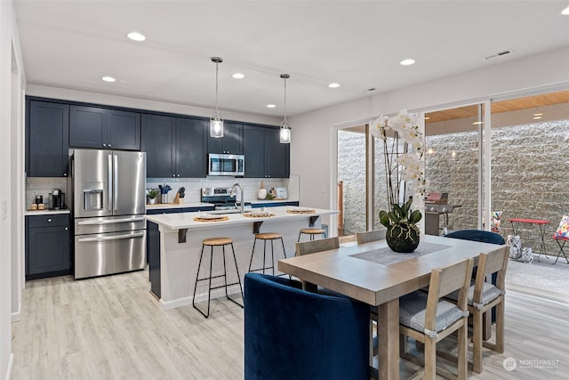 dining area featuring light hardwood / wood-style floors