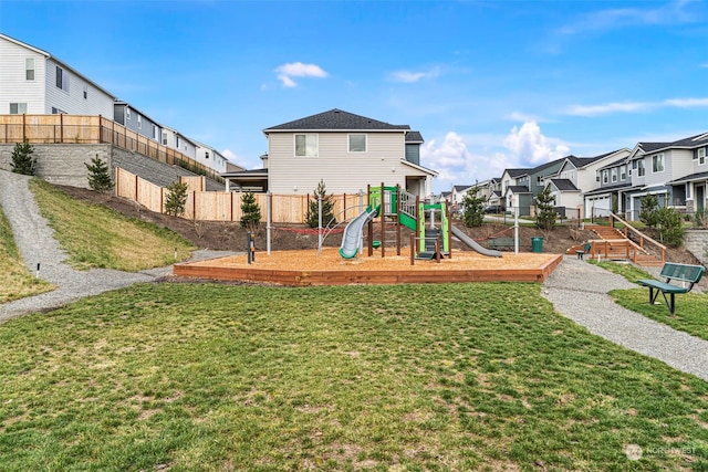 view of play area featuring a lawn