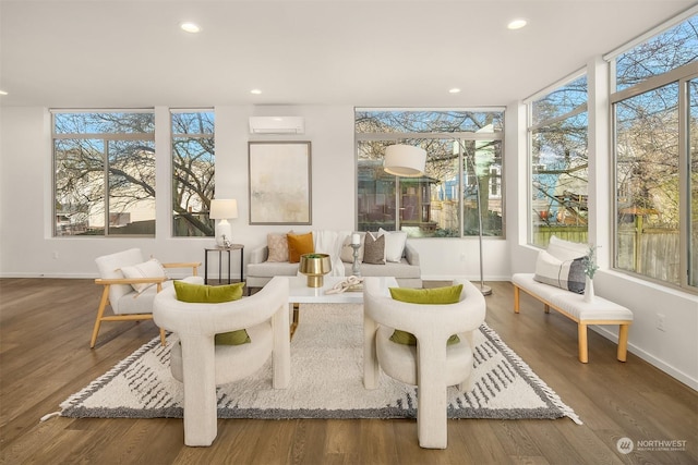 sunroom featuring a wall mounted air conditioner