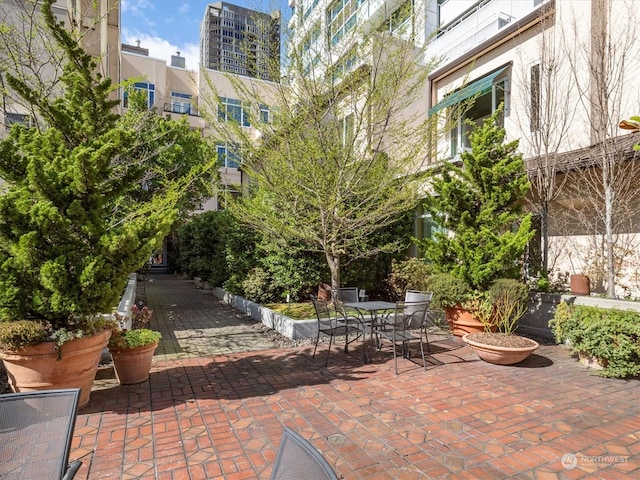 view of property's community featuring a patio