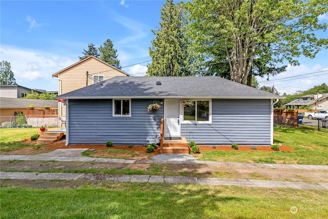 view of front of house with a front lawn