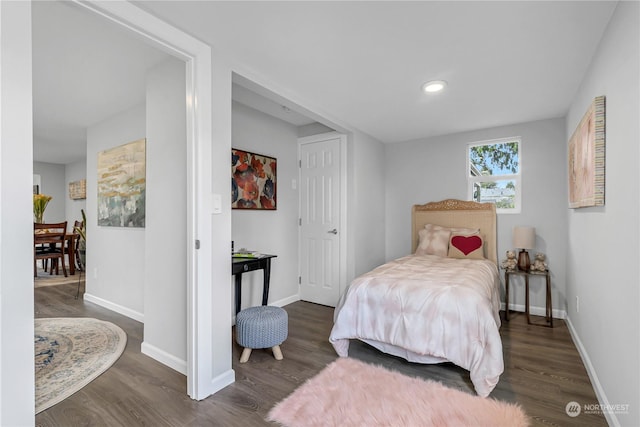 bedroom featuring dark hardwood / wood-style floors