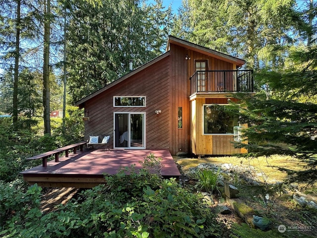 213 Madrona Way, Sequim, WA 98382 - rear view of house featuring a wooden deck and a balcony
