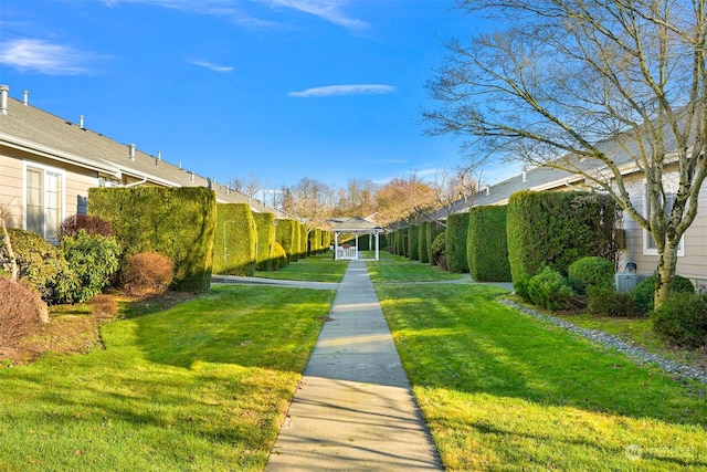 surrounding community featuring a yard and a gazebo