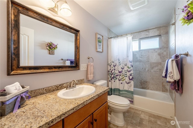 full bathroom featuring shower / tub combo, vanity, and toilet