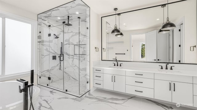 bathroom featuring vanity and an enclosed shower