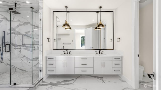 bathroom featuring vanity and a shower with shower door