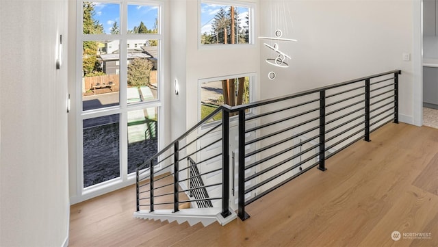 stairway featuring hardwood / wood-style flooring