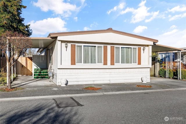 view of front of property with a carport