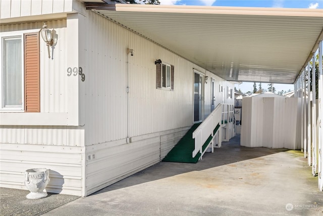 exterior space featuring a carport