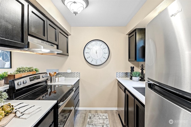 kitchen featuring light hardwood / wood-style flooring and appliances with stainless steel finishes