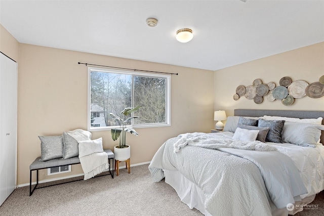 bedroom featuring carpet