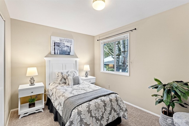 bedroom with light carpet