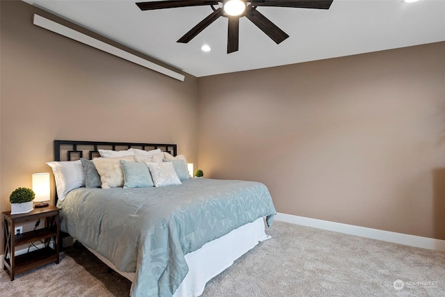 carpeted bedroom featuring ceiling fan