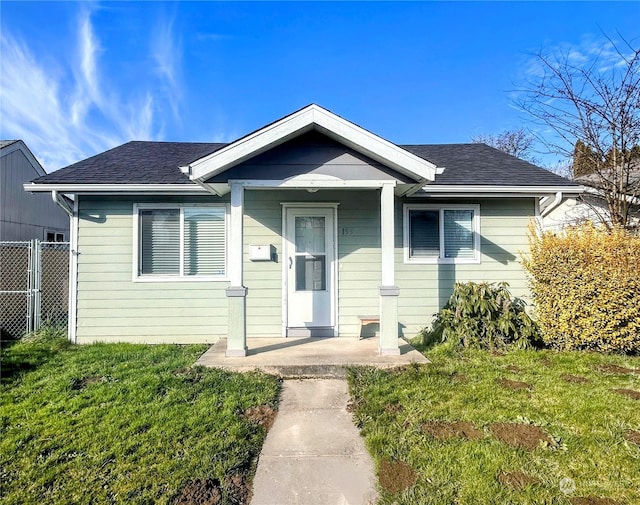 bungalow with a front yard