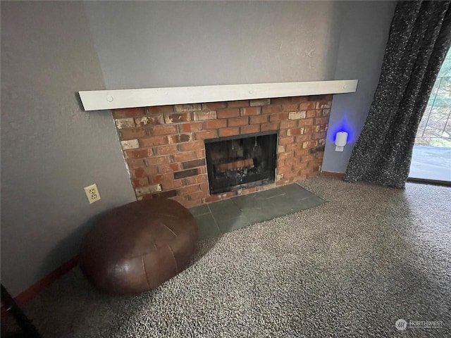 interior details featuring carpet floors and a fireplace