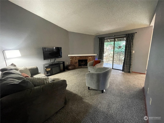 carpeted living room with a brick fireplace and a textured ceiling