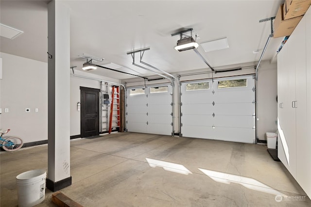 garage featuring a garage door opener