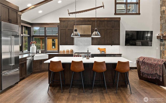 120 Rocky Run Loop, Cle Elum, WA 98922 - kitchen featuring stainless steel appliances, decorative backsplash, dark wood-type flooring, recessed lighting, and dark brown cabinets