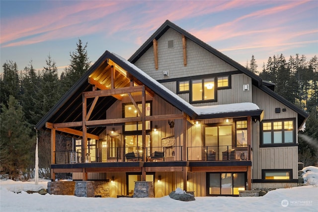 view of snow covered house